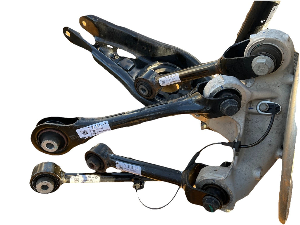 17-23 Tesla Model 3 Rear Left Suspension Knuckle Spindle Lower Arm Complete.